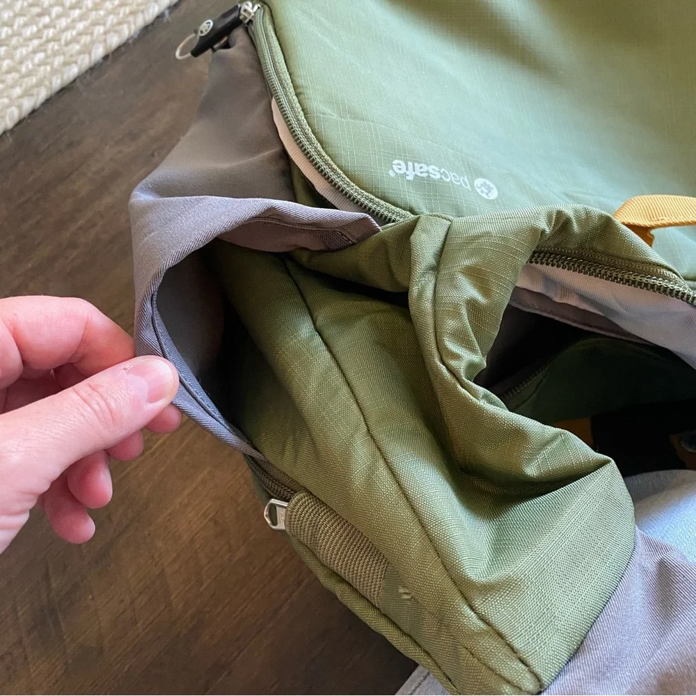 Pacsafe Olive Green and Mustard Yellow Crossbody Camera Bag